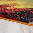 wzorzysty czerwono-pomarańczowy dywan